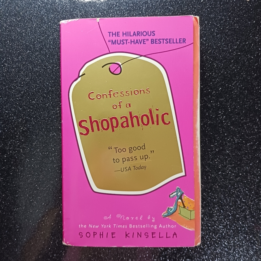 Confessions of a Shopaholic by Sophie Kinsella.
